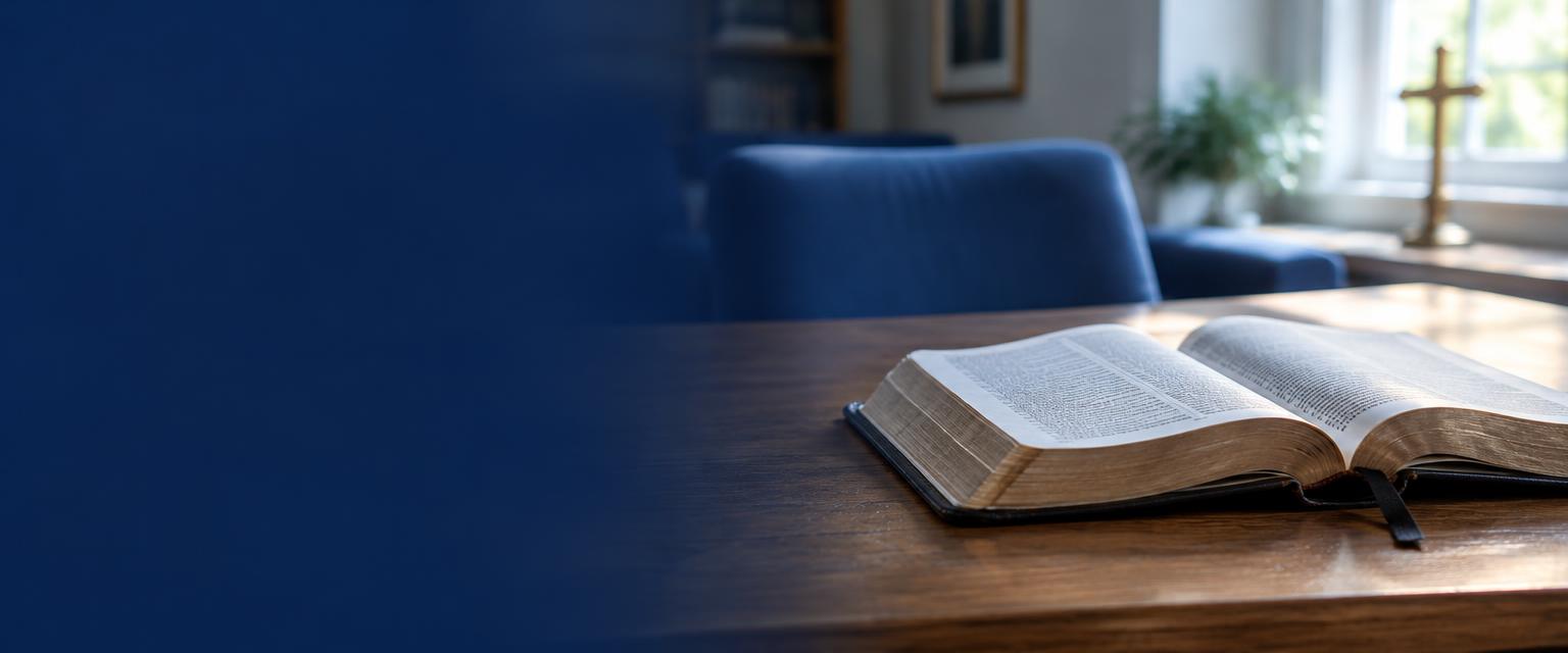 An open Bible in a sunlit church study room
